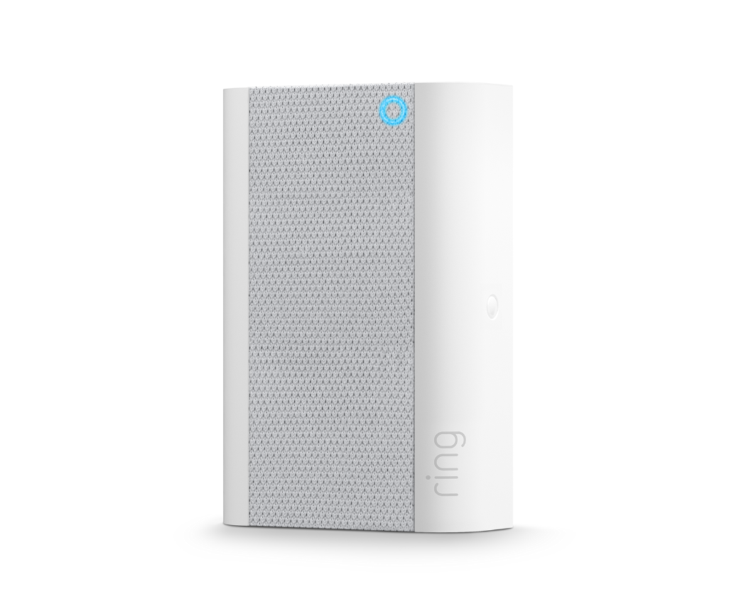 Witte cilindrische Ring-alarm. Het heeft een mesh voorpaneel en een blauw lampje bovenop. Witte achtergrond.