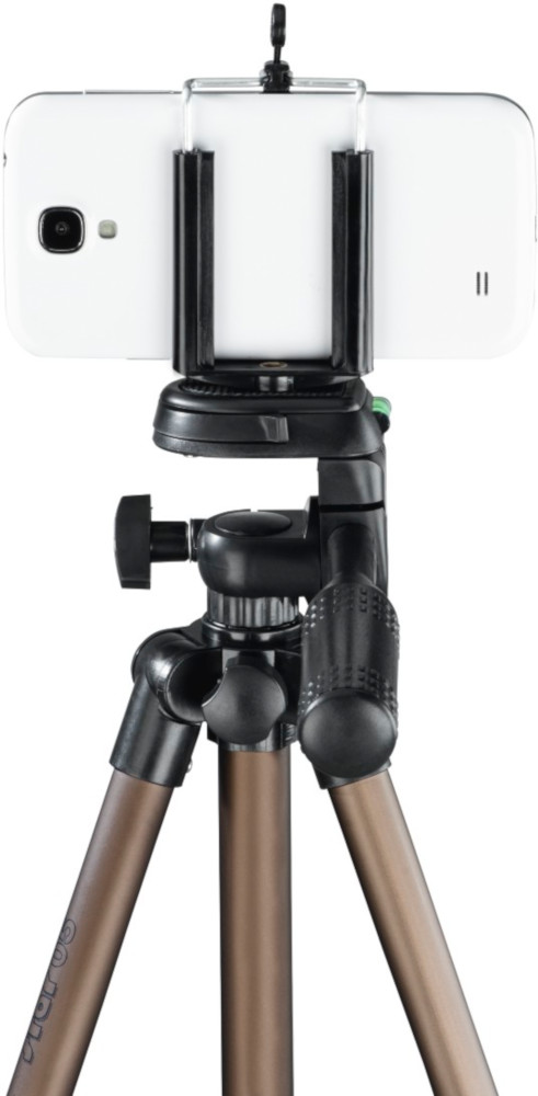 Tripod with a phone mount holding a phone. Bronze legs, black mechanisms.