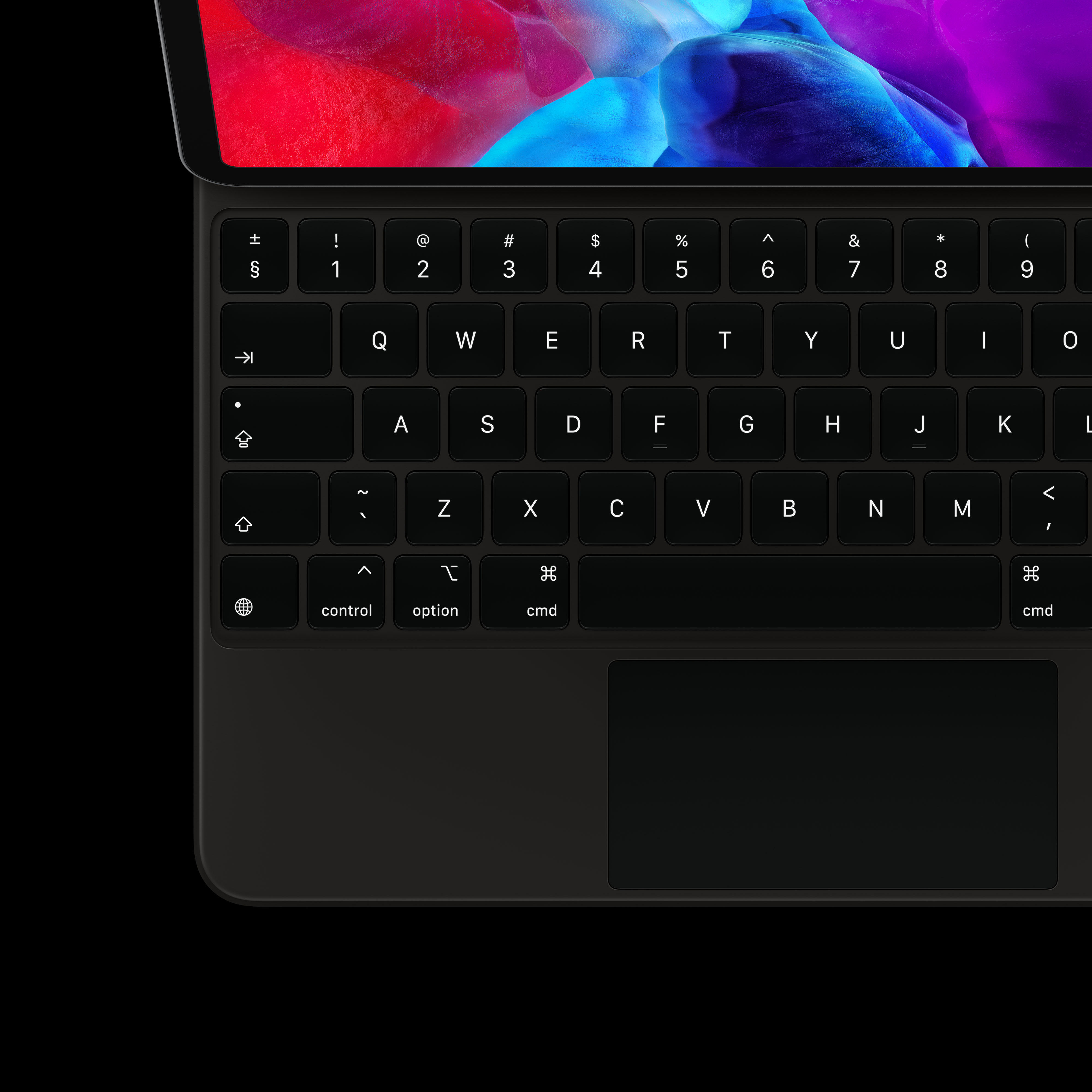 Nahaufnahme einer schwarzen Tastatur mit Touchpad und Tasten.