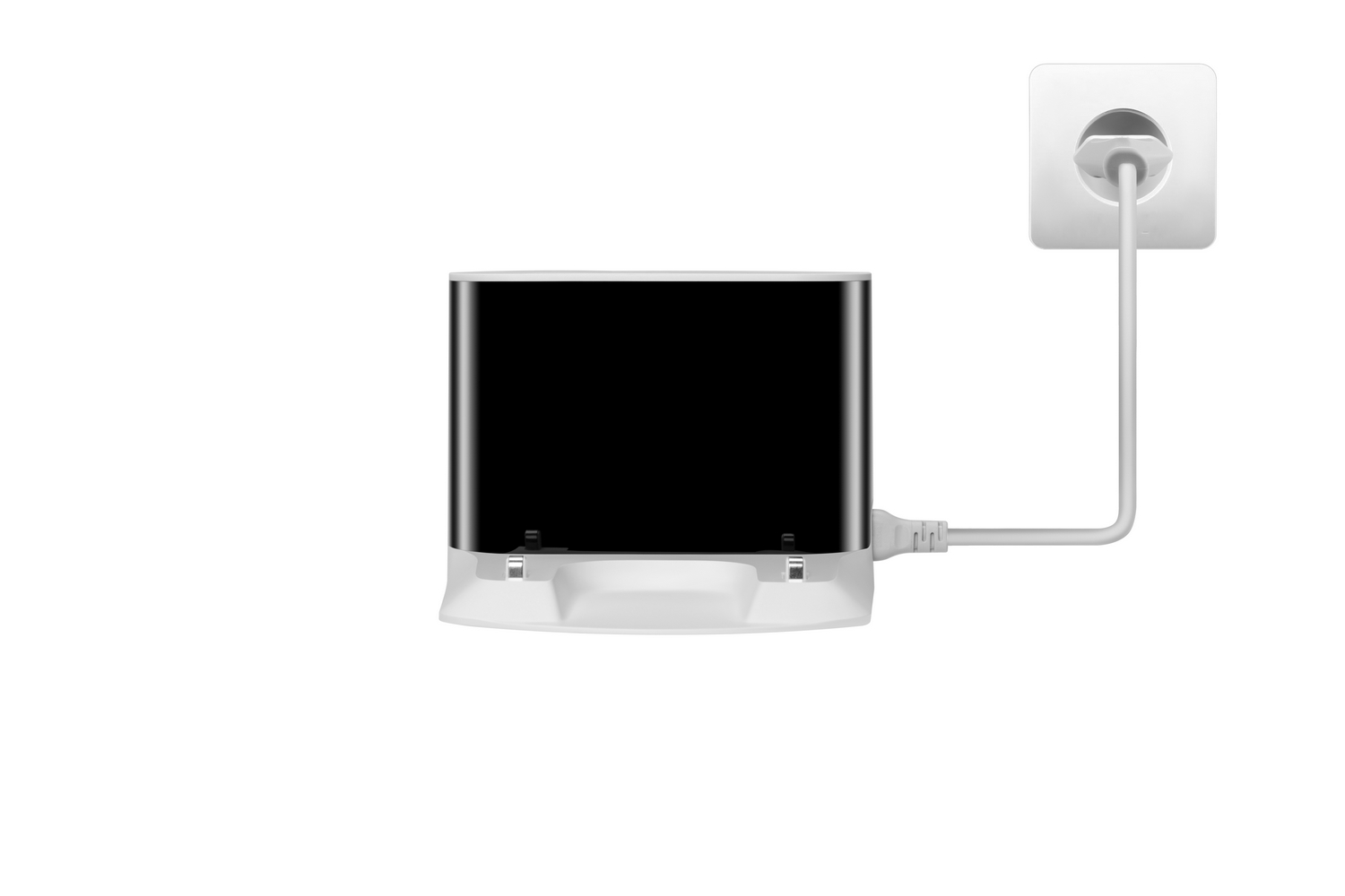 Dispositivo negro sobre una base blanca, enchufado a un enchufe de pared con cable blanco.