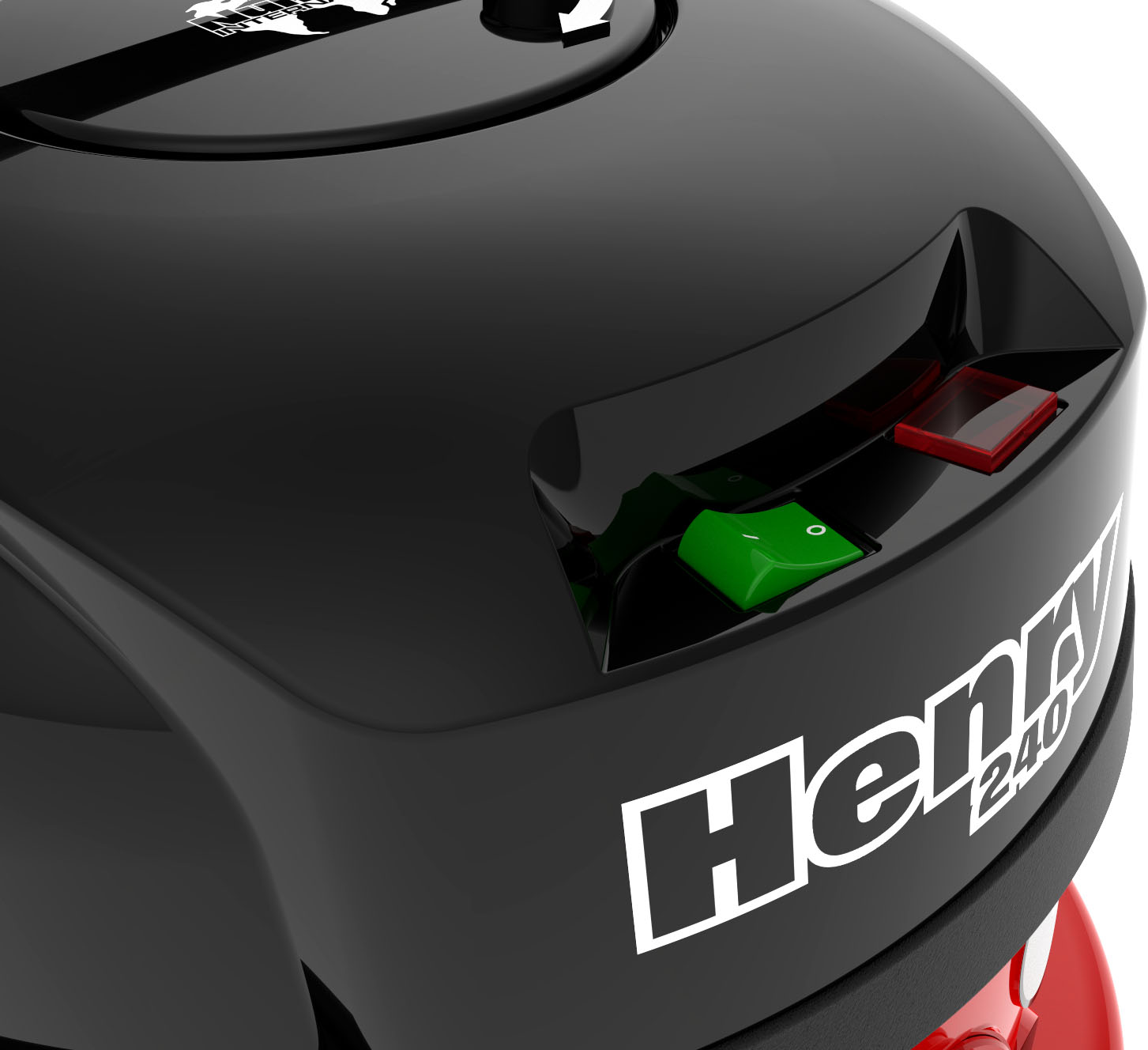 Close-up of black Henry 2.0 vacuum cleaner's top. Green power button and red switch.