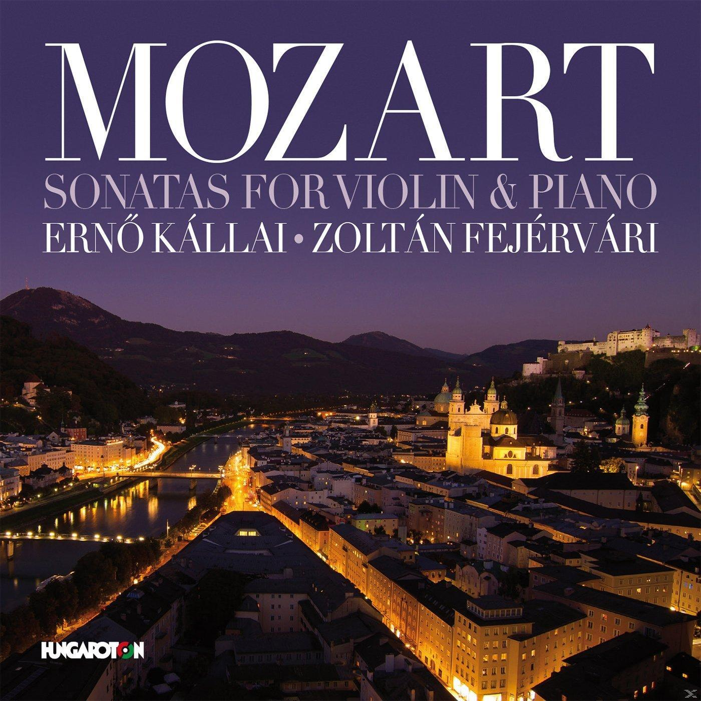 Album borító 'MOZART' és 'Sonatas for Violin & Piano' felirattal. Városkép a háttérben.