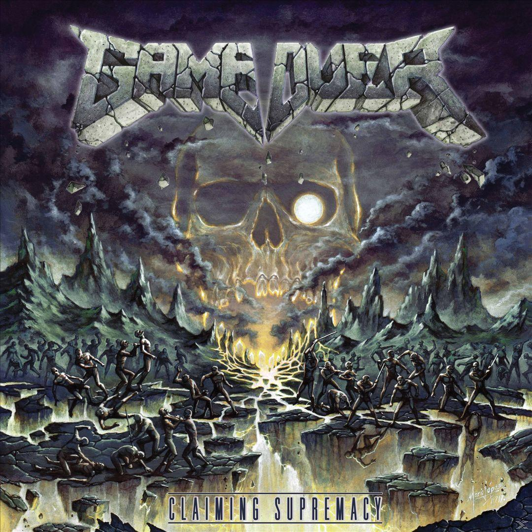 Albumcover mit Totenkopf mit Feuer, kämpfenden Figuren und dem Text 'Game Over'.