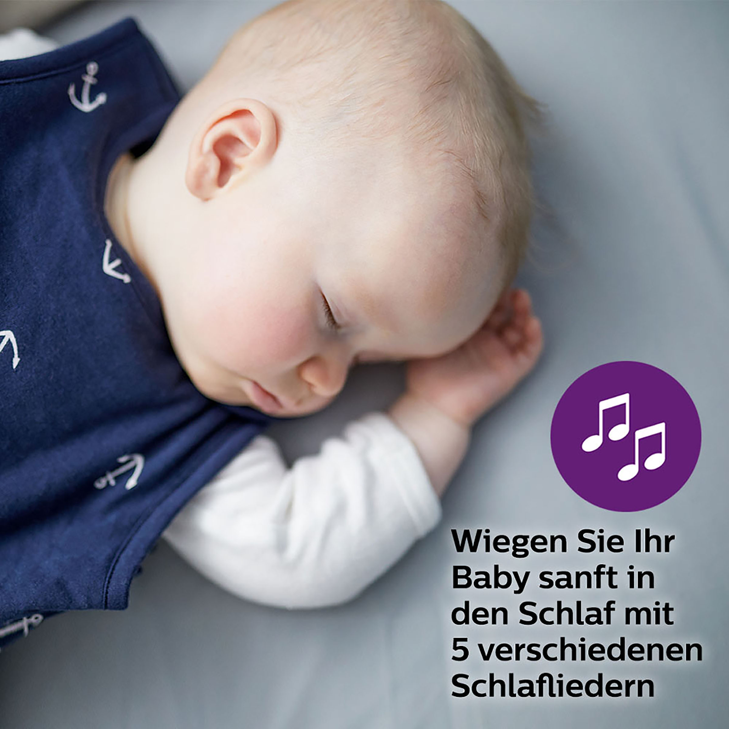 Ein schlafendes Baby liegt auf einer grauen Oberfläche, mit Text über Schlaflieder in der Ecke.