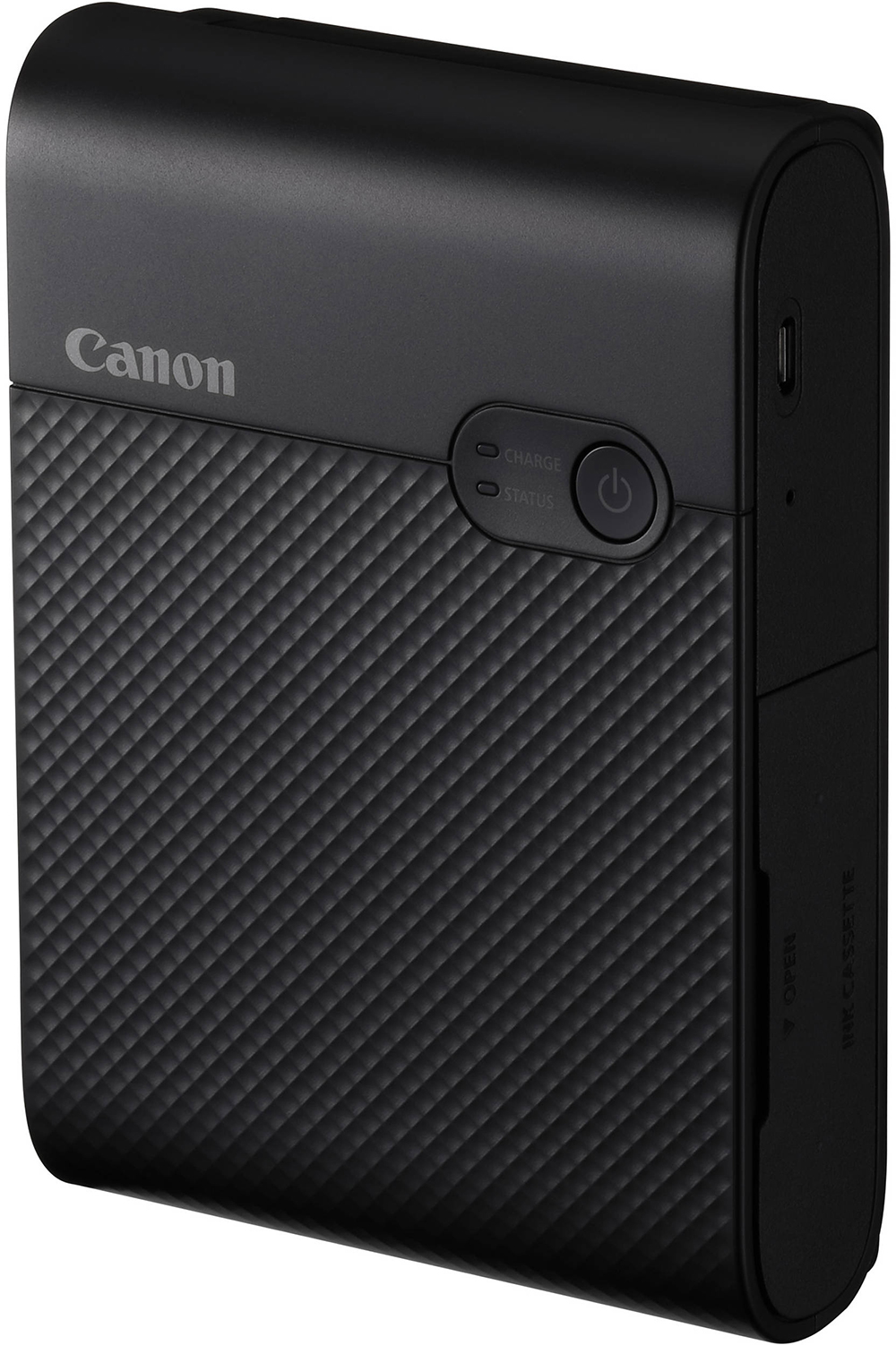 Imprimante Canon noire avec panneau avant texturé, boutons et port de charge.