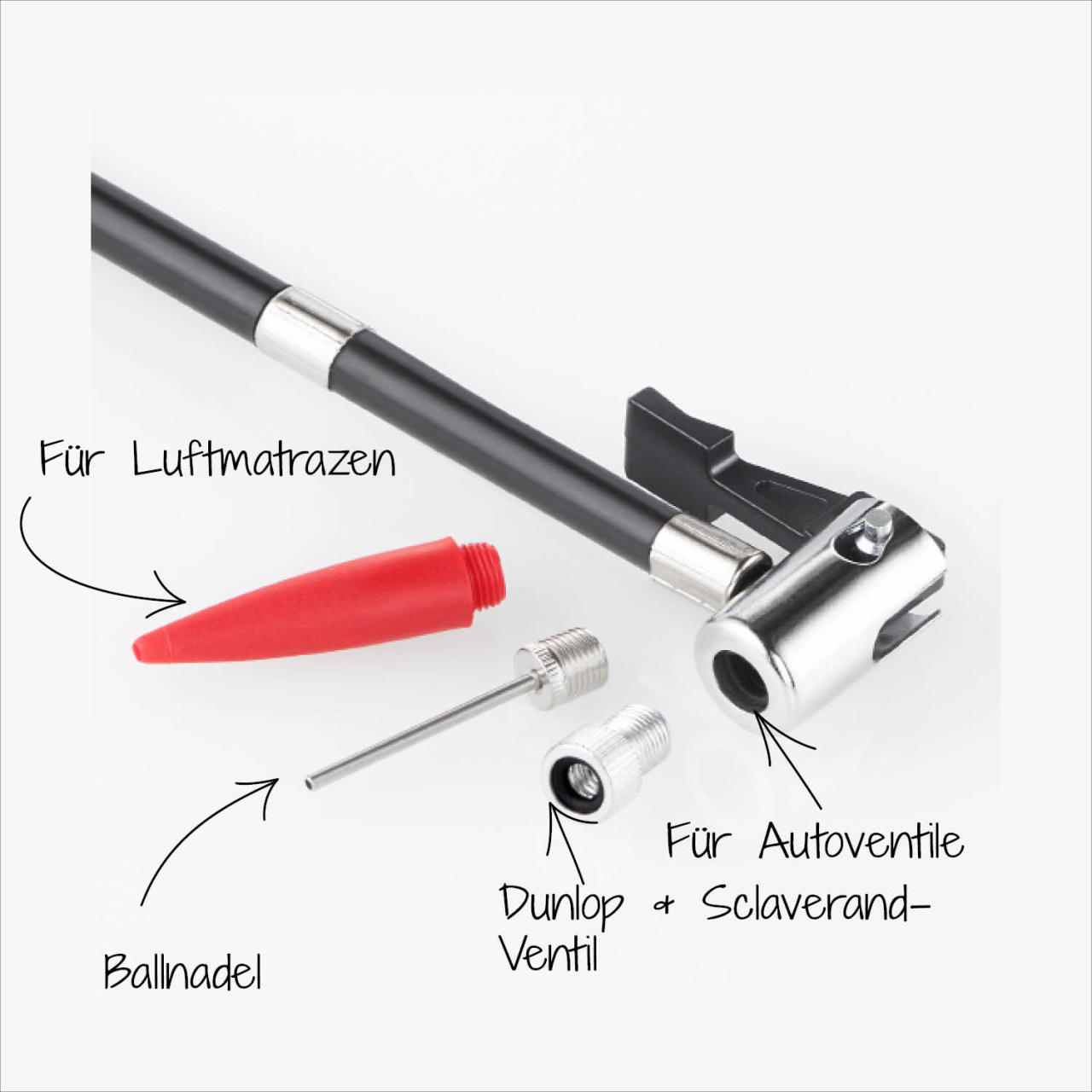 Teile zum Aufblasen. Roter Düse, Nadel und Adapter für verschiedene Ventile.