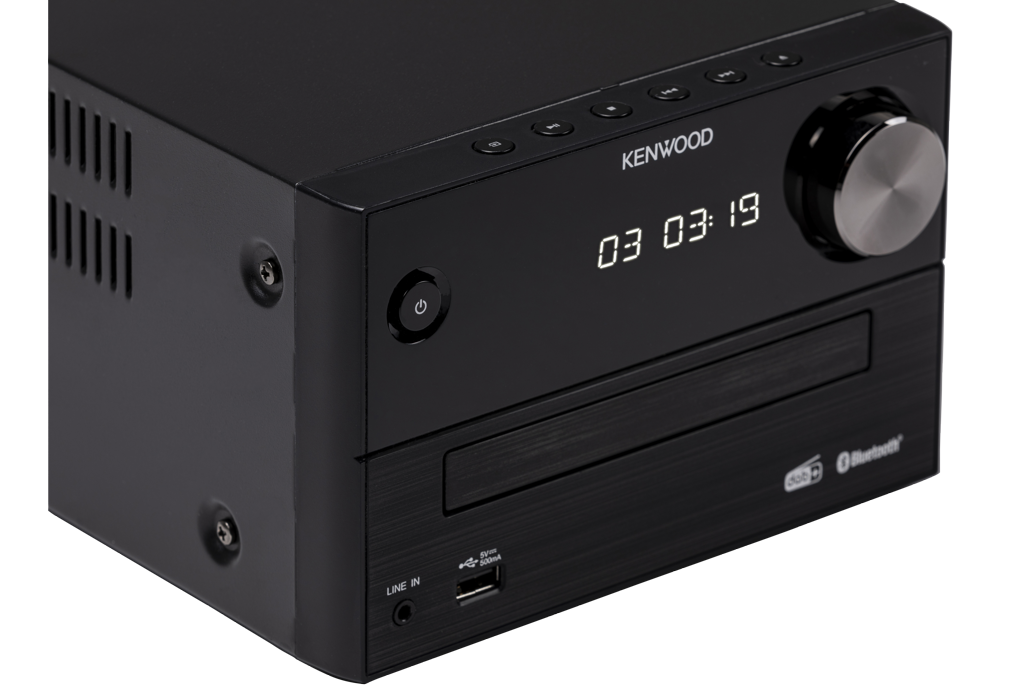 Black Kenwood stereo system with a CD slot, display, and control knob. It is on a black surface.