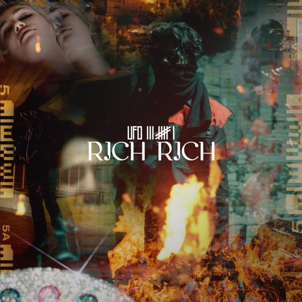 Albumcover mit dem Gesicht einer Frau, überlagert von einem Männergesicht, Feuer und Text.