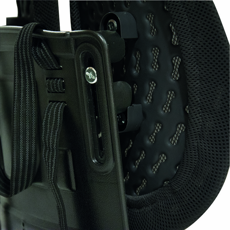 Close-up of a black chair back with a black mesh and a supportive frame.