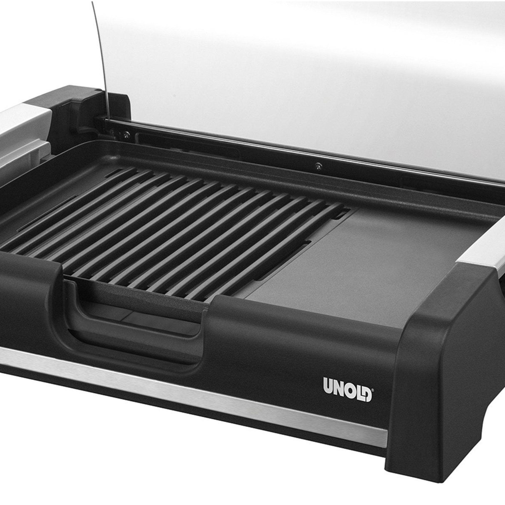Elektromos grill fekete alappal, fém díszítéssel és átlátszó fedővel, közelkép.