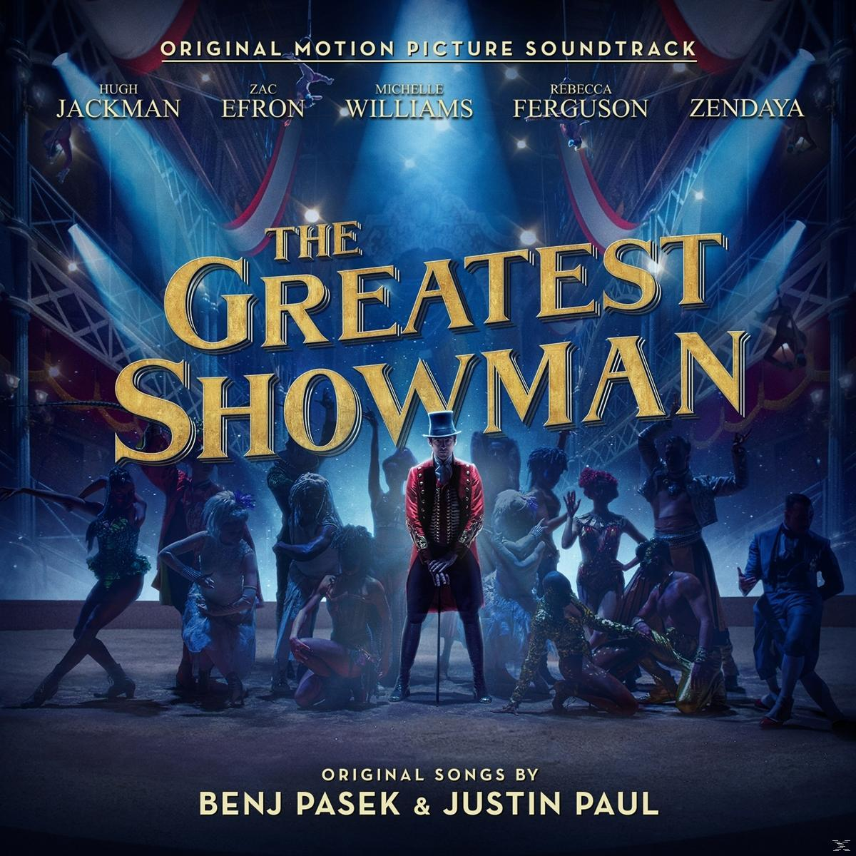 'A legnagyobb showman' filmplakátja, Hugh Jackman-nel és cirkuszi előadókkal, egy élénk jelenetben.