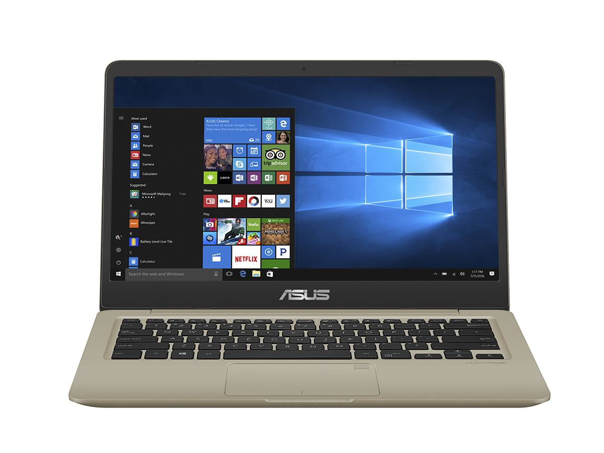 Ein offener, goldener ASUS Laptop mit Windows 10 Betriebssystem und geöffnetem Startmenü.