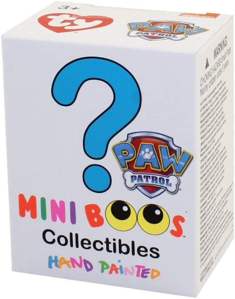 Eine Paw Patrol Mini Boos Collectibles Box. Sie ist weiß und hat ein Fragezeichen und das Paw Patrol Logo.