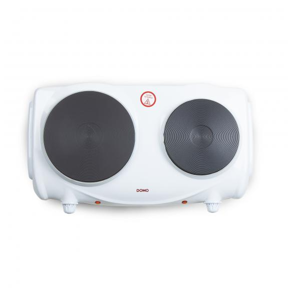 A white double hotplate with two black cooking surfaces and red dials.
