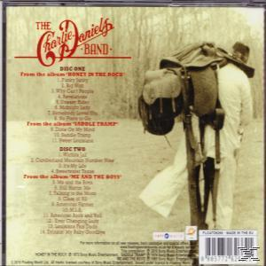 A "The Charlie Daniels Band" album hátlapja, egy cowboy ruhás férfit ábrázol nagy hátizsákkal.