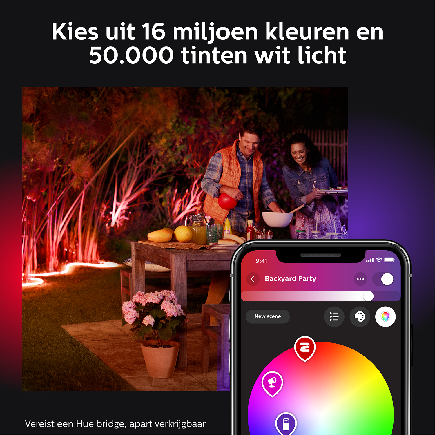 People at a backyard party with colorful lighting. A phone shows a color wheel.