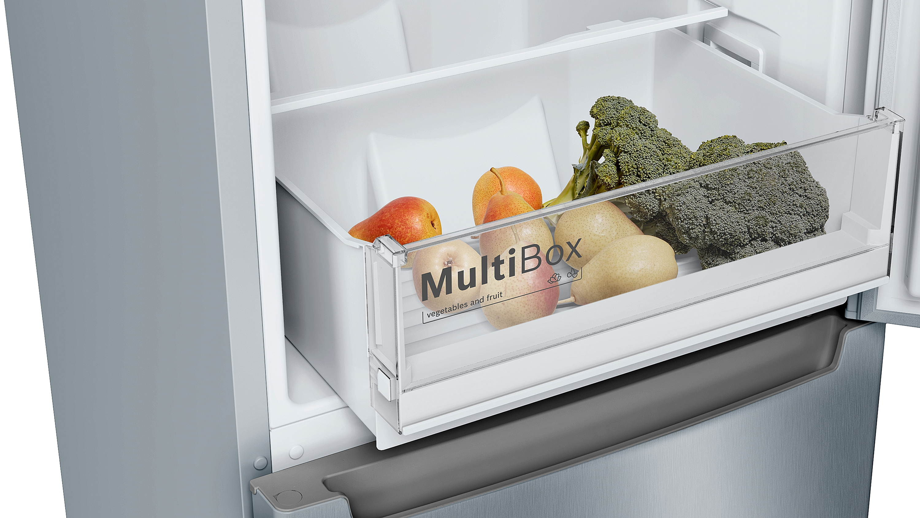 Eine Schublade voller frischer Produkte, Birnen, Äpfel, Brokkoli.