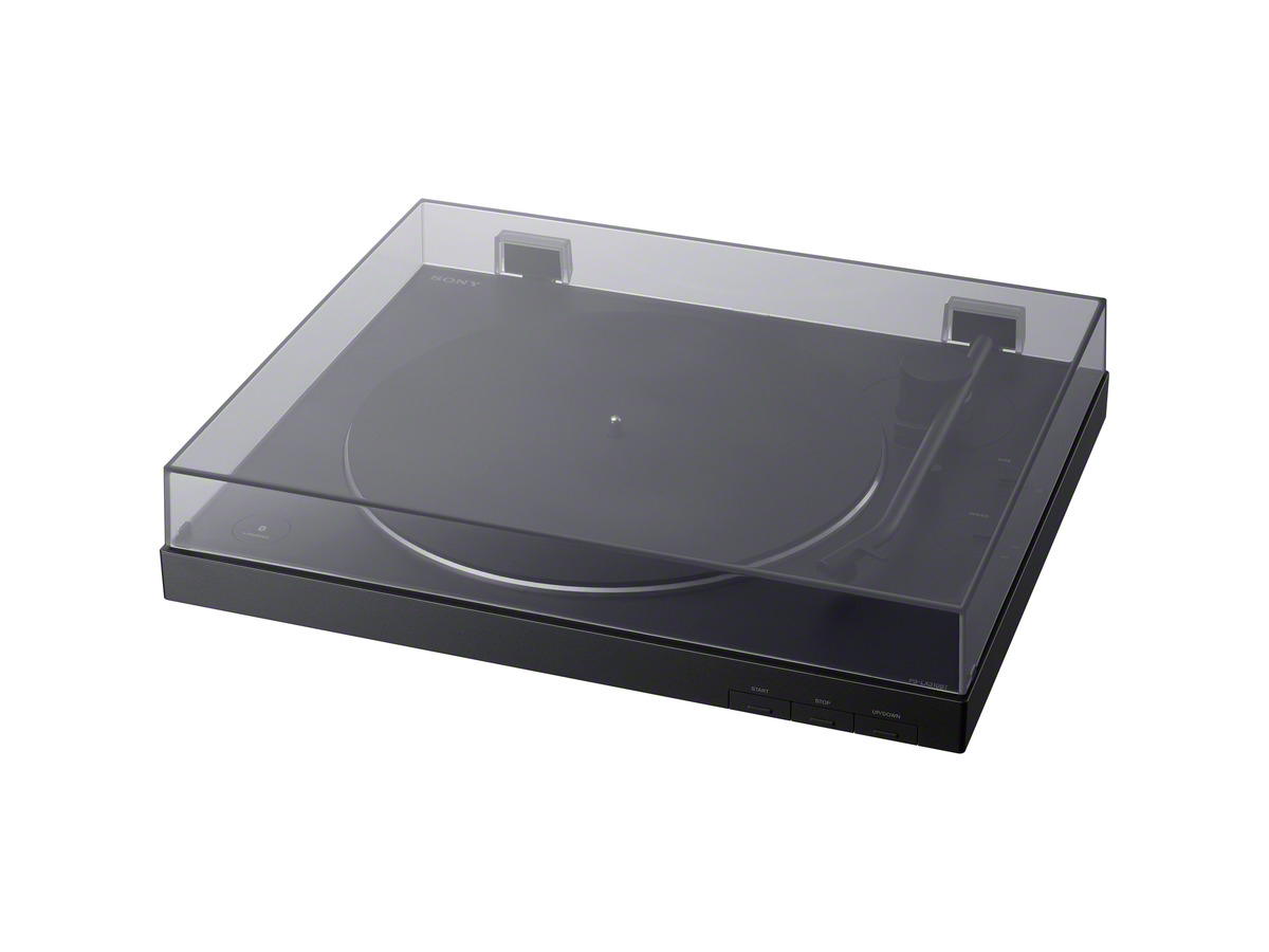 A black turntable with a transparent cover, with buttons on the front.