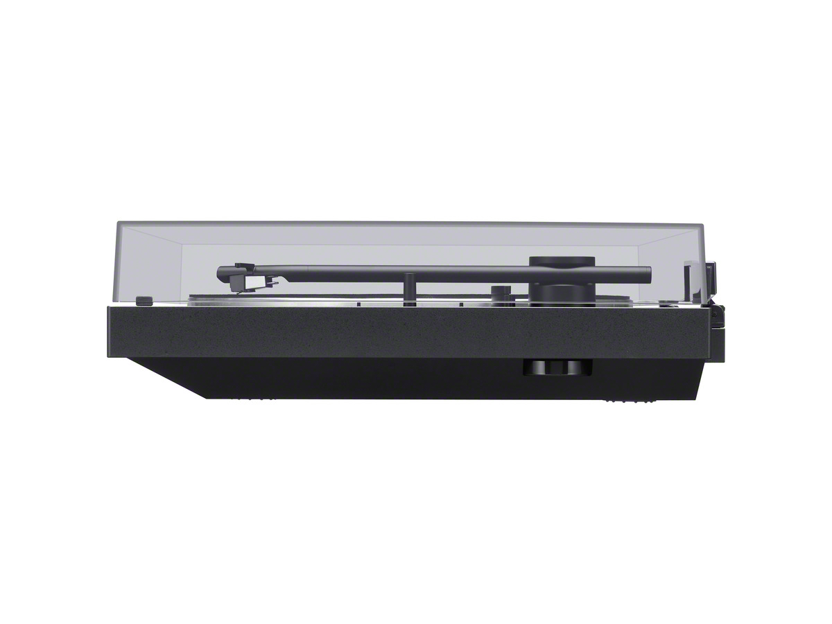 Side view of a black turntable with a clear plastic cover. The turntable is on a white background.