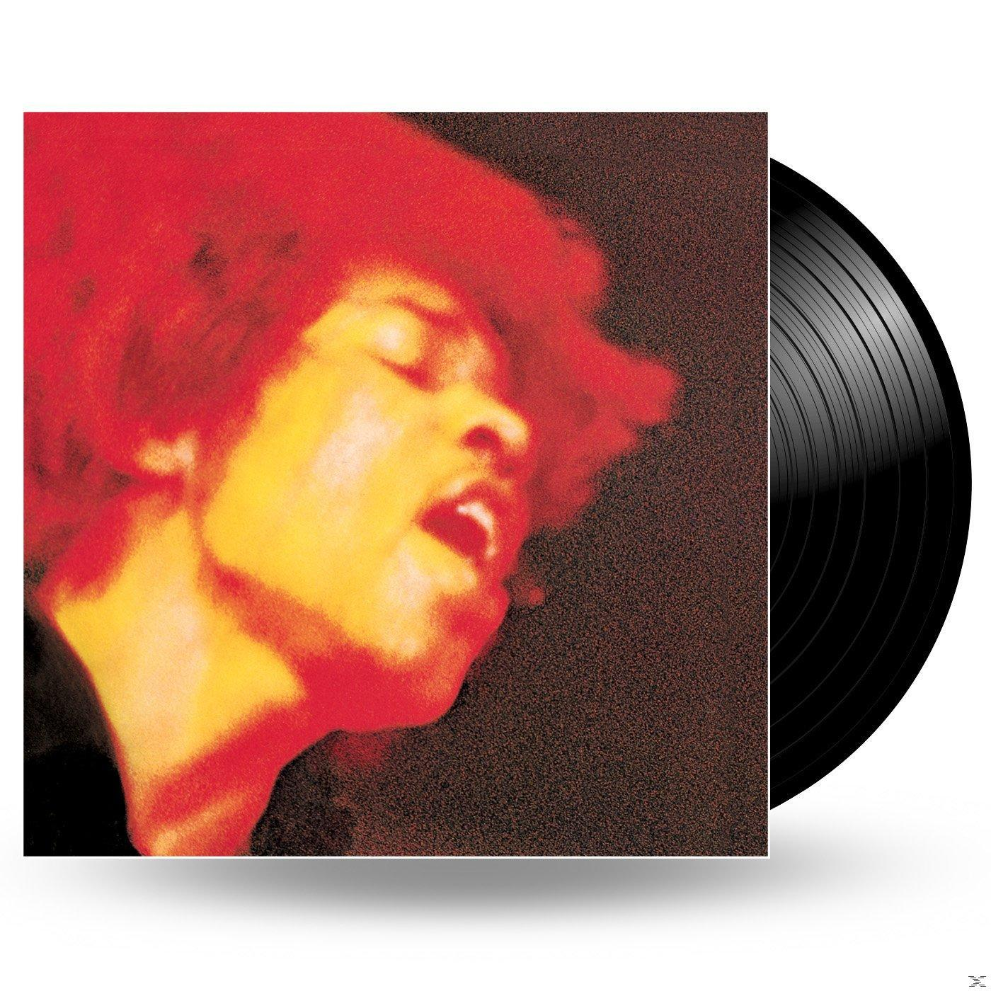 Jimi Hendrix album borítója homályos piros és sárga képével az arcáról.