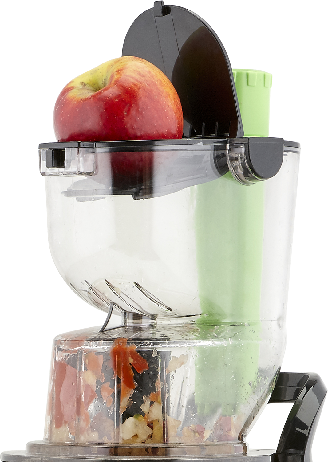 Keukenmachine met appel. De machine is transparant, met een rode appel erin.