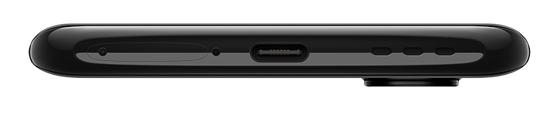 Primer plano del borde inferior de un teléfono negro, con puerto de carga.