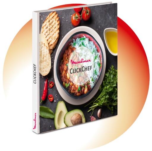Libro de cocina en una mesa, con la portada que presenta un plato de comida y el título.