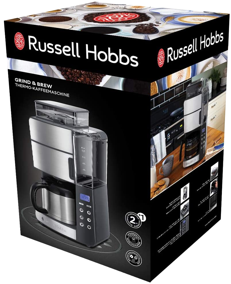 A dobozon egy Russell Hobbs Grind & Brew kávéfőző látható. A dobozon a termék és a kávéval kapcsolatos vizuális elemek láthatók.