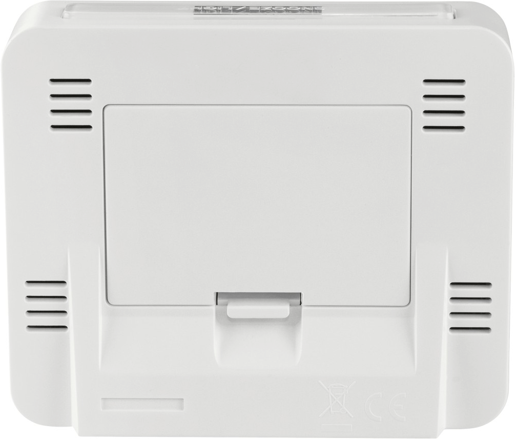 Dos d'un appareil blanc et rectangulaire avec des ouvertures et une porte rectangulaire.