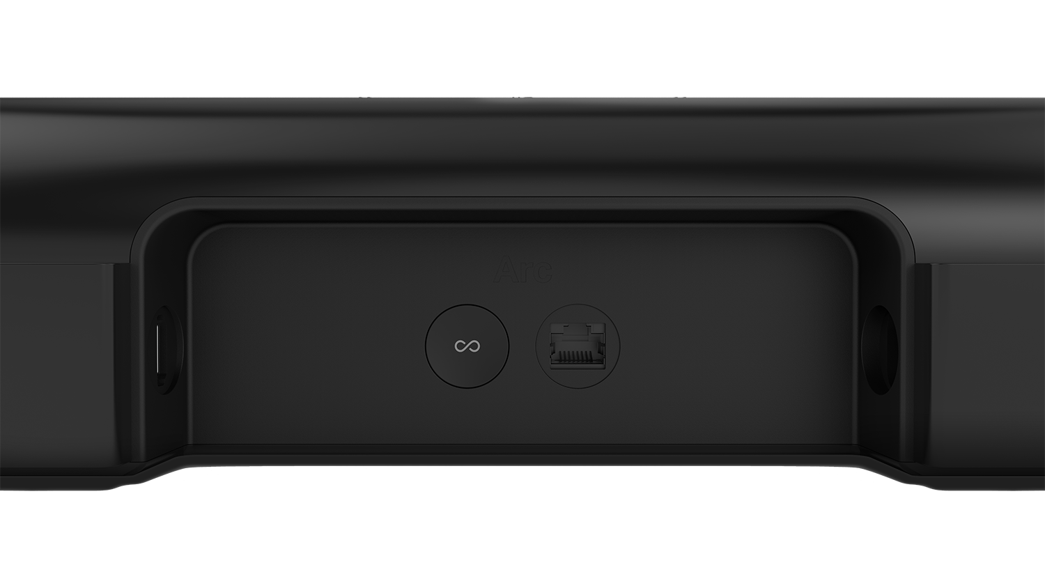 De achterkant van een zwarte soundbar met poorten en een knop.