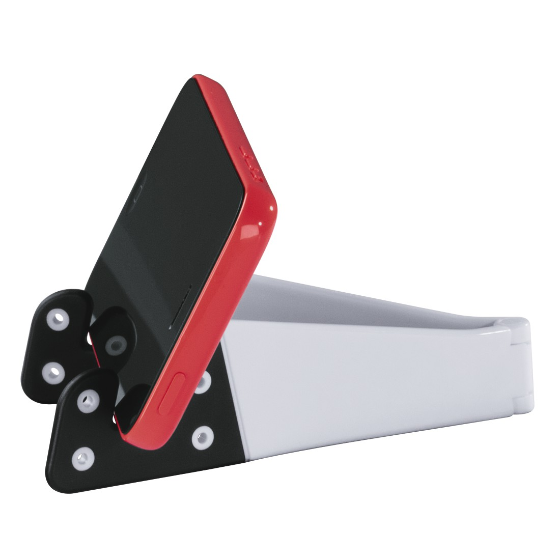 Ein Telefon mit roter Hülle steht in einem weißen und schwarzen Ständer.
