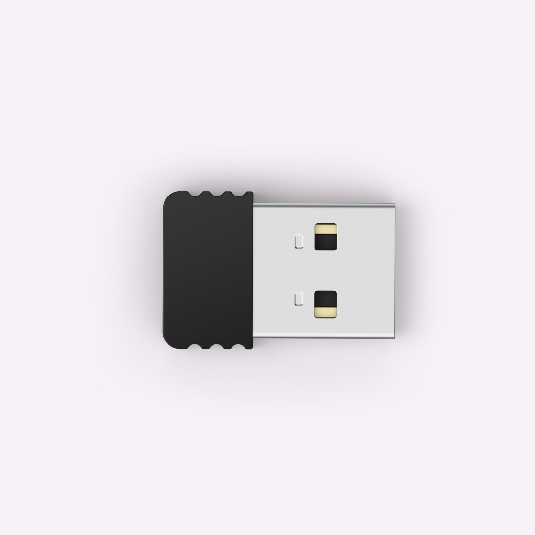 USB-Dongle, schwarzer Körper und silberner Stecker. Draufsicht auf einer rosa Oberfläche.