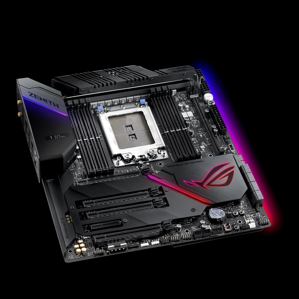 Ein schwarzes Motherboard mit ROG-Logo. Der Hintergrund ist schwarz mit blauen und roten Lichtern.