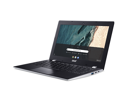 Portátil Acer Chromebook negro, abierto sobre una superficie blanca con un fondo negro.