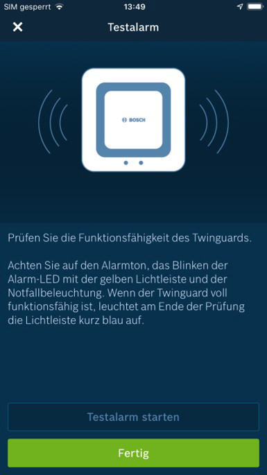 App-Oberfläche auf einem Telefon, zeigt einen Testalarmbildschirm.