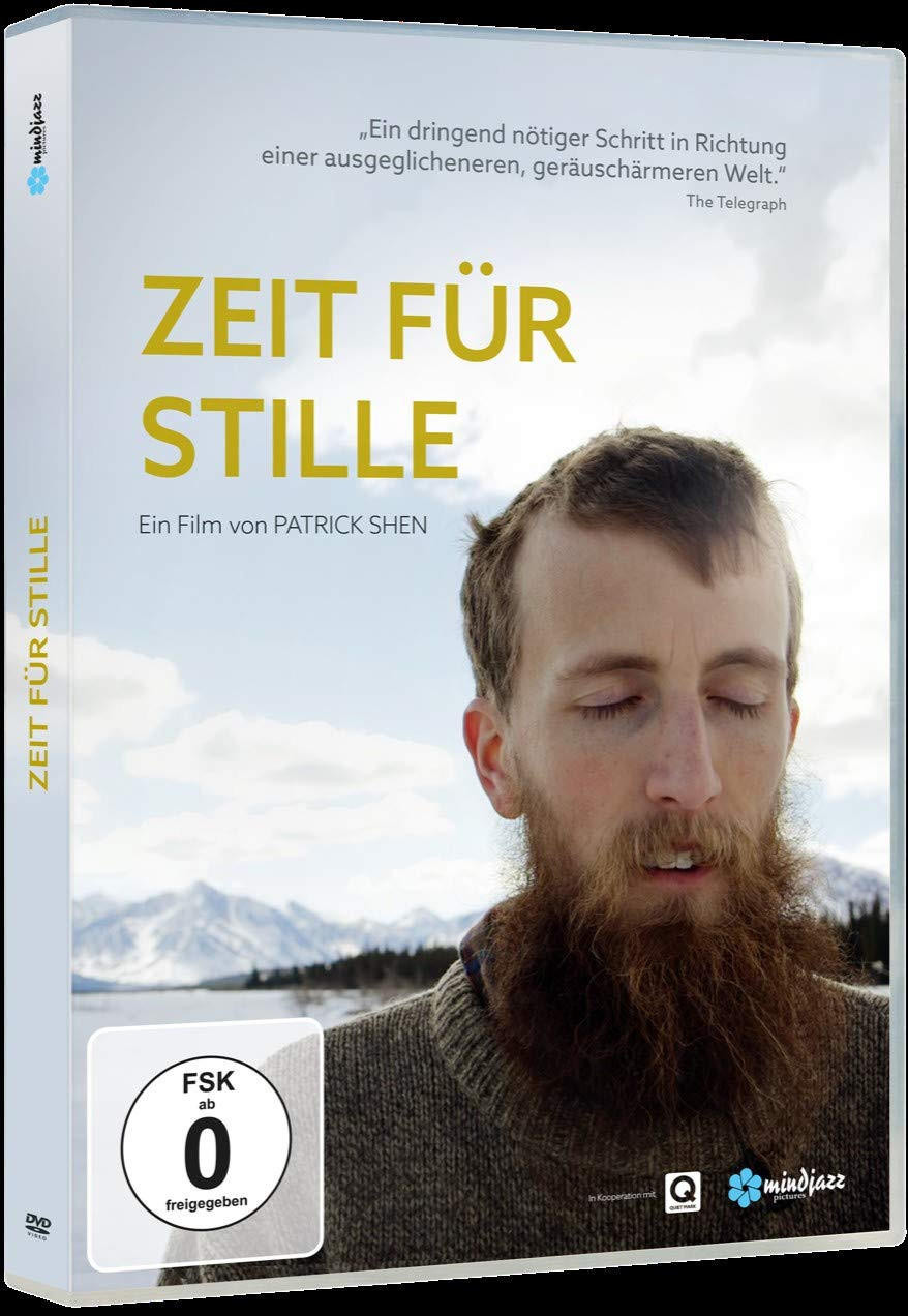 DVD-Cover, Mann mit Bart, Augen geschlossen. Titel "Zeit für Stille". Berge im Hintergrund. FSK 0 Logo.
