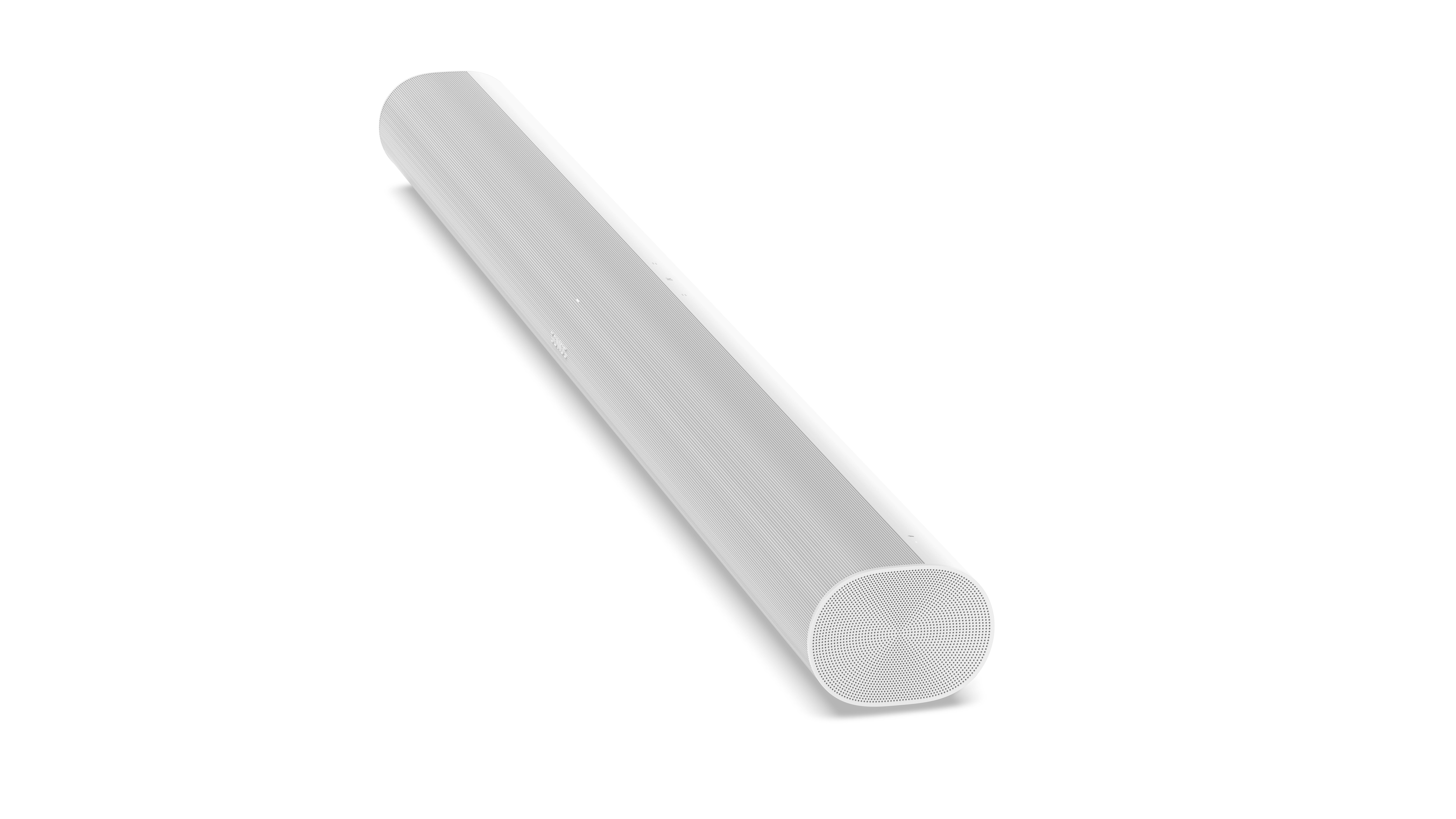 Eine weiße, zylindrische Soundbar liegt auf einer weißen Oberfläche. Die Oberfläche ist gleichmäßig beleuchtet.