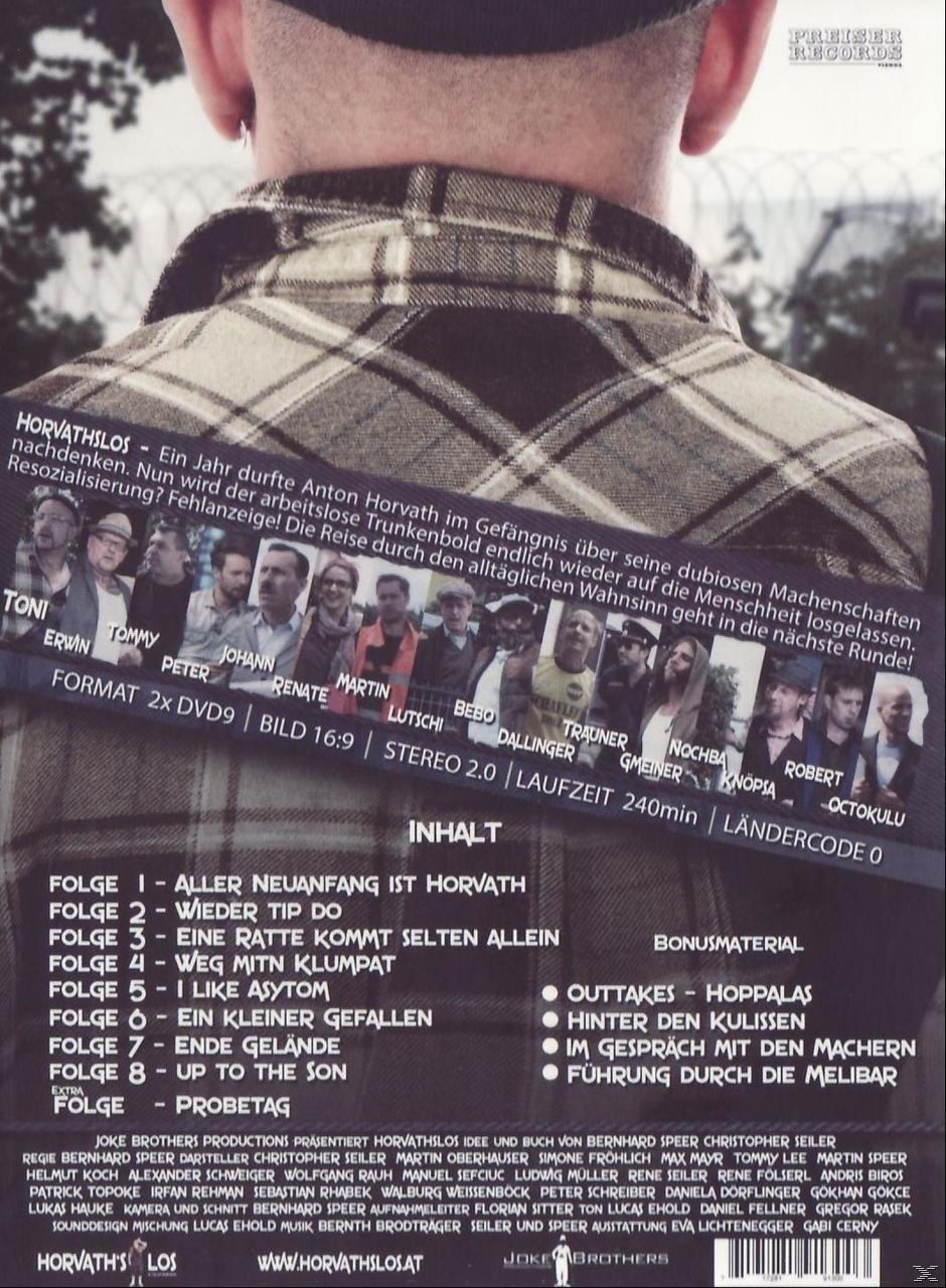 Rückseite eines Mannes mit einem Filmplakat im Hintergrund. Das Plakat ist auf Deutsch.