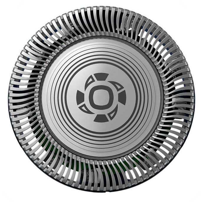 Close-up of a silver shaver head with a circular design and a pattern of slots.