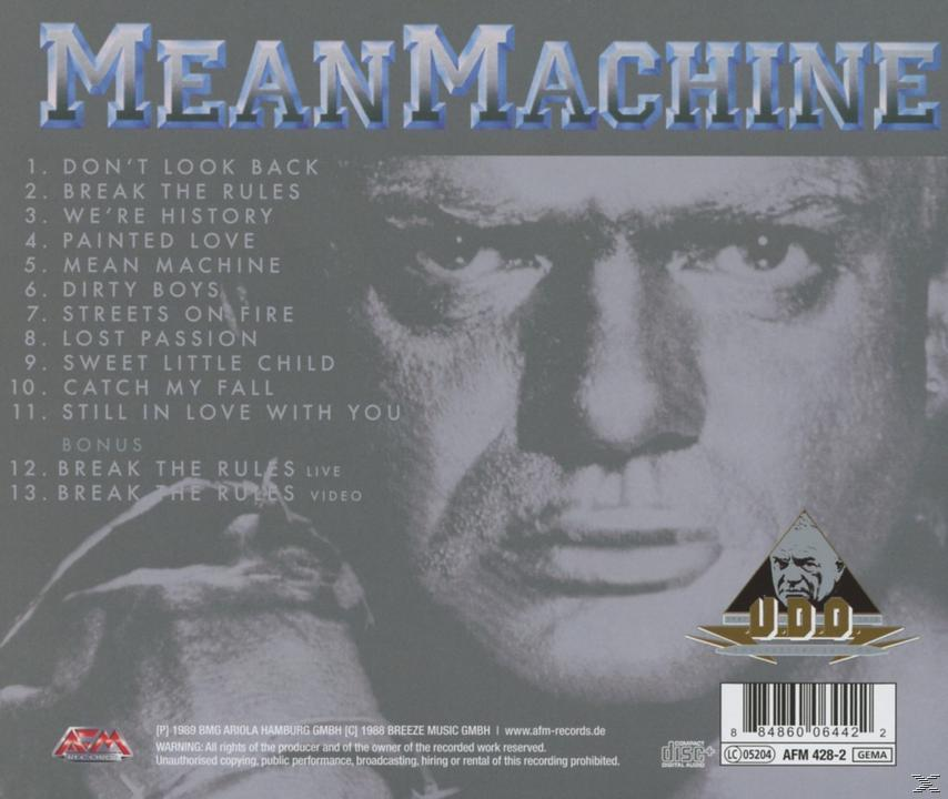 CD borító a 'Mean Machine' album címmel, számok listája, egy férfi arcának közelképe.