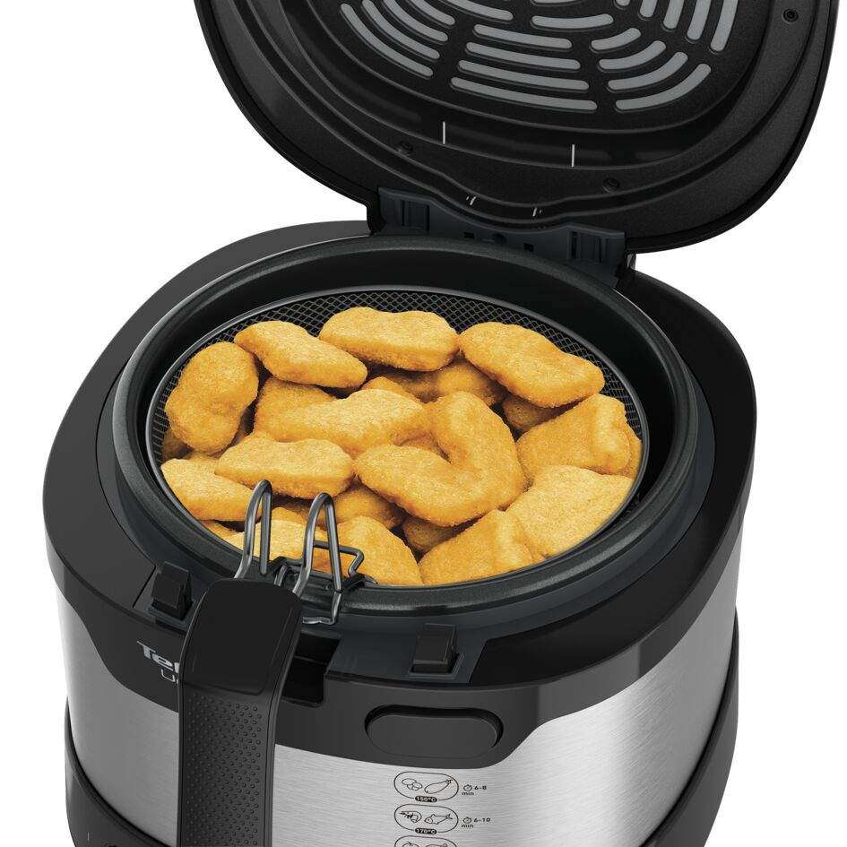 Nyitott fritőz, benne nuggetsekkel.