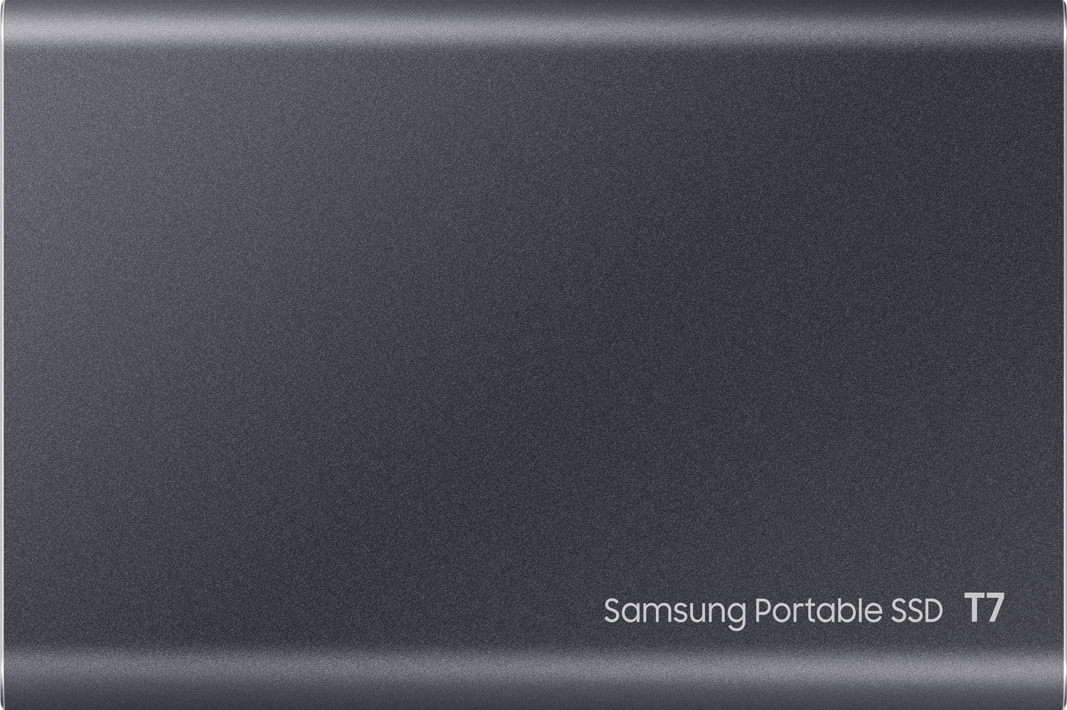 Dark gray Samsung Portable SSD T7. The surface is textured. White text says 'Samsung Portable SSD T7'.