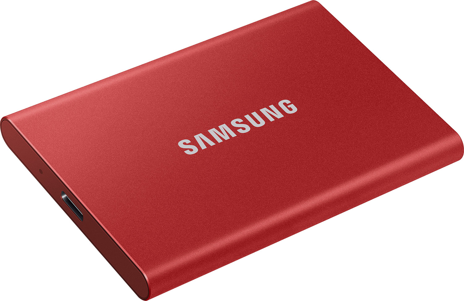 Disque SSD portable Samsung rouge sur une surface blanche. Le mot SAMSUNG est visible.