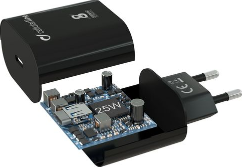 Chargeur de téléphone noir. Démonté, montrant le circuit interne et un port USB.