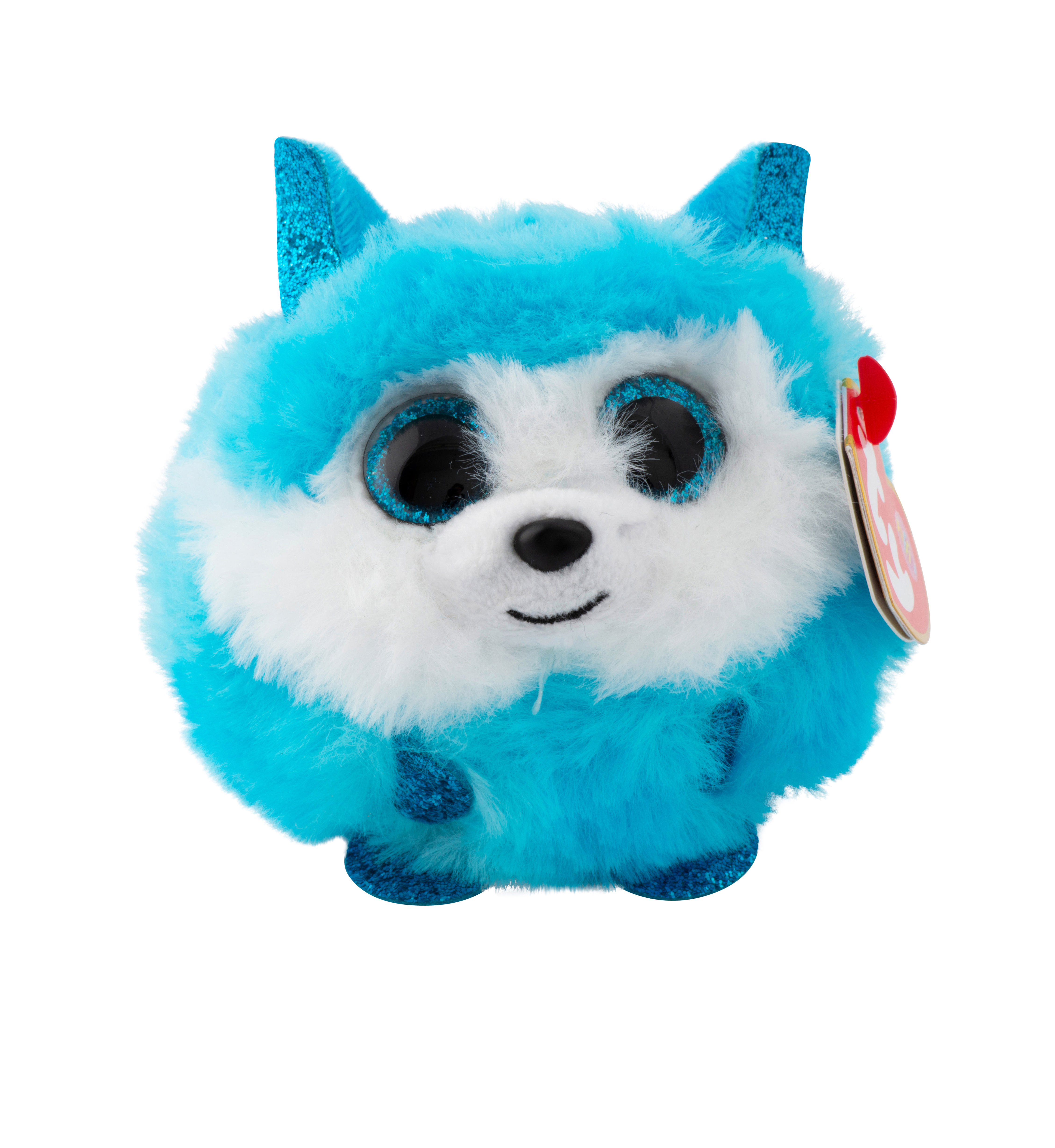 Ein blau-weißes, flauschiges Stofftier mit großen Augen und einem roten Etikett.