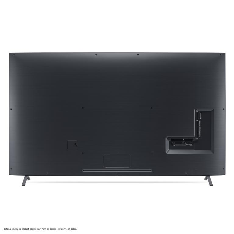 Parte trasera de un televisor negro con patas, que muestra puertos y conexiones sobre un fondo blanco.