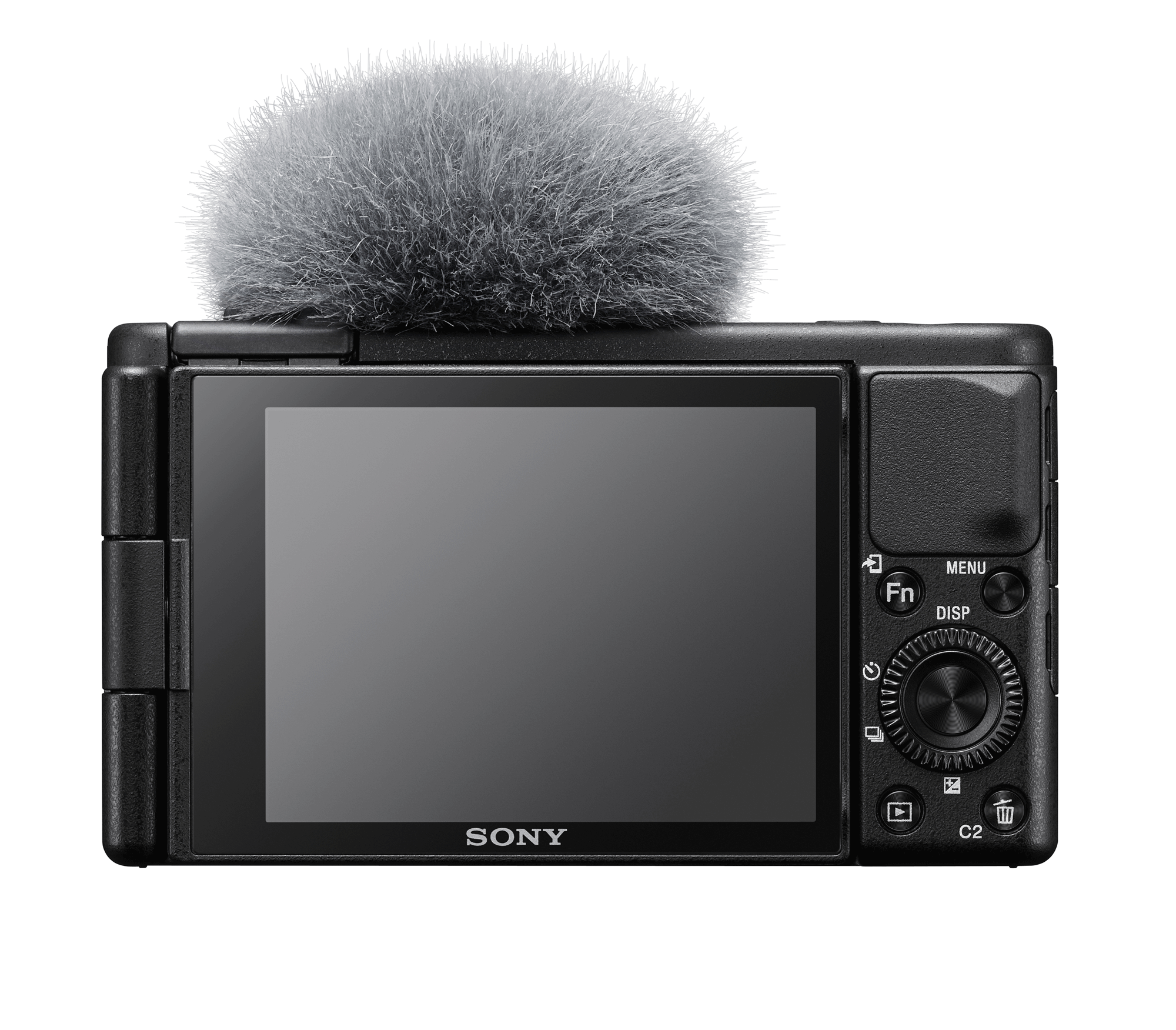 Black Sony camera with a microphone. The camera has a screen on the back and is on a white surface.