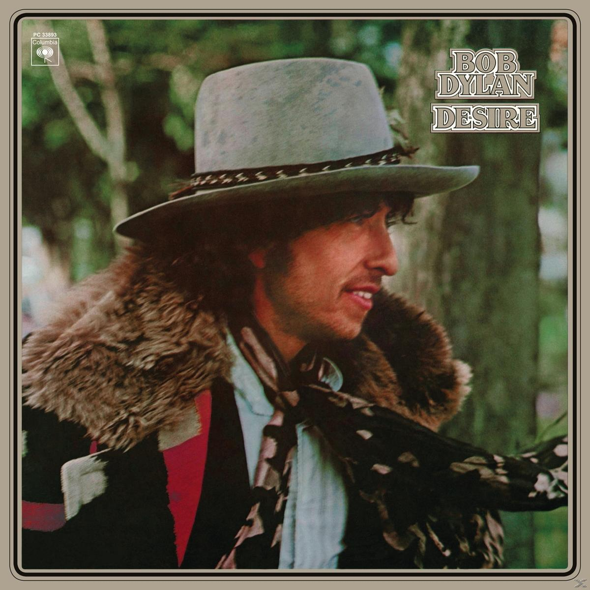 Bob Dylan Albumcover. Mann mit Hut, Pelzmantel und Schal. Titel: Desire.