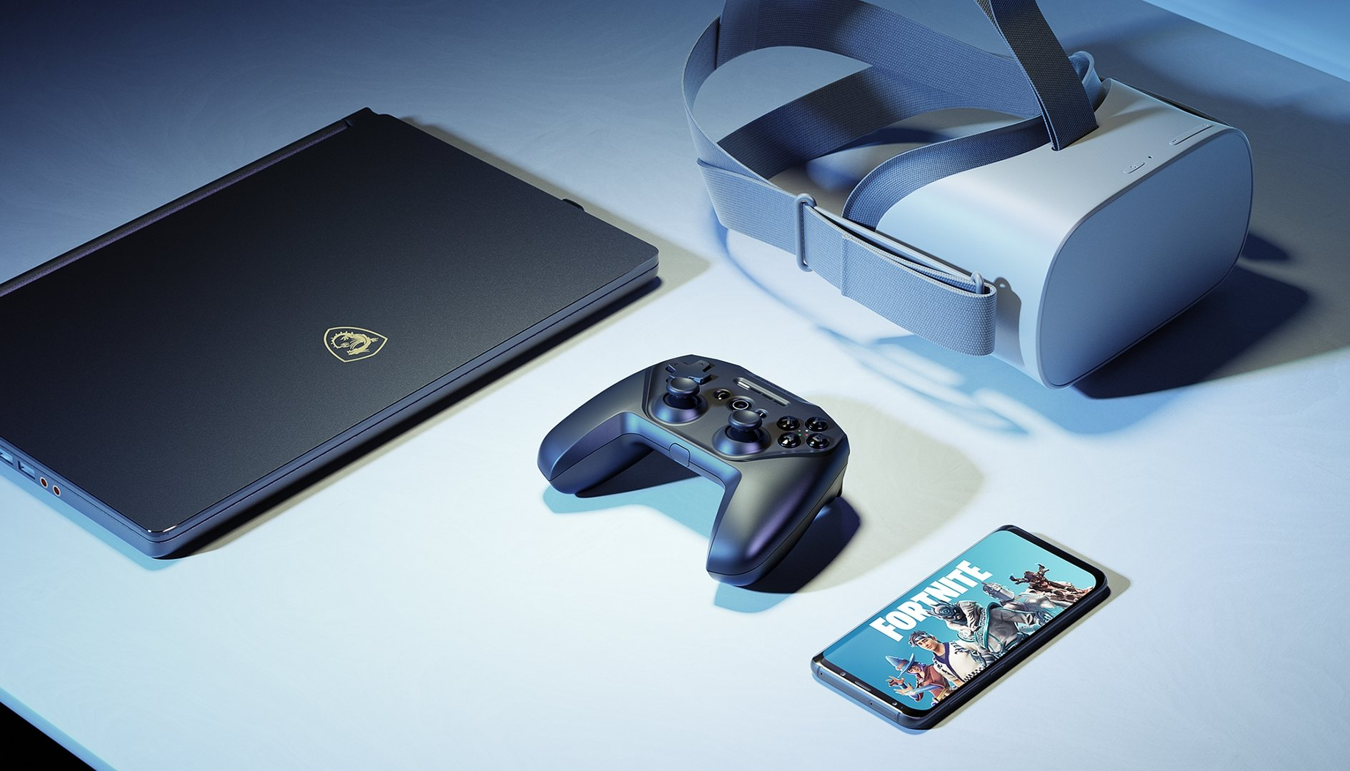 Játékbeállítás laptop, VR headset, gamepad és egy játékot megjelenítő okostelefonnal.