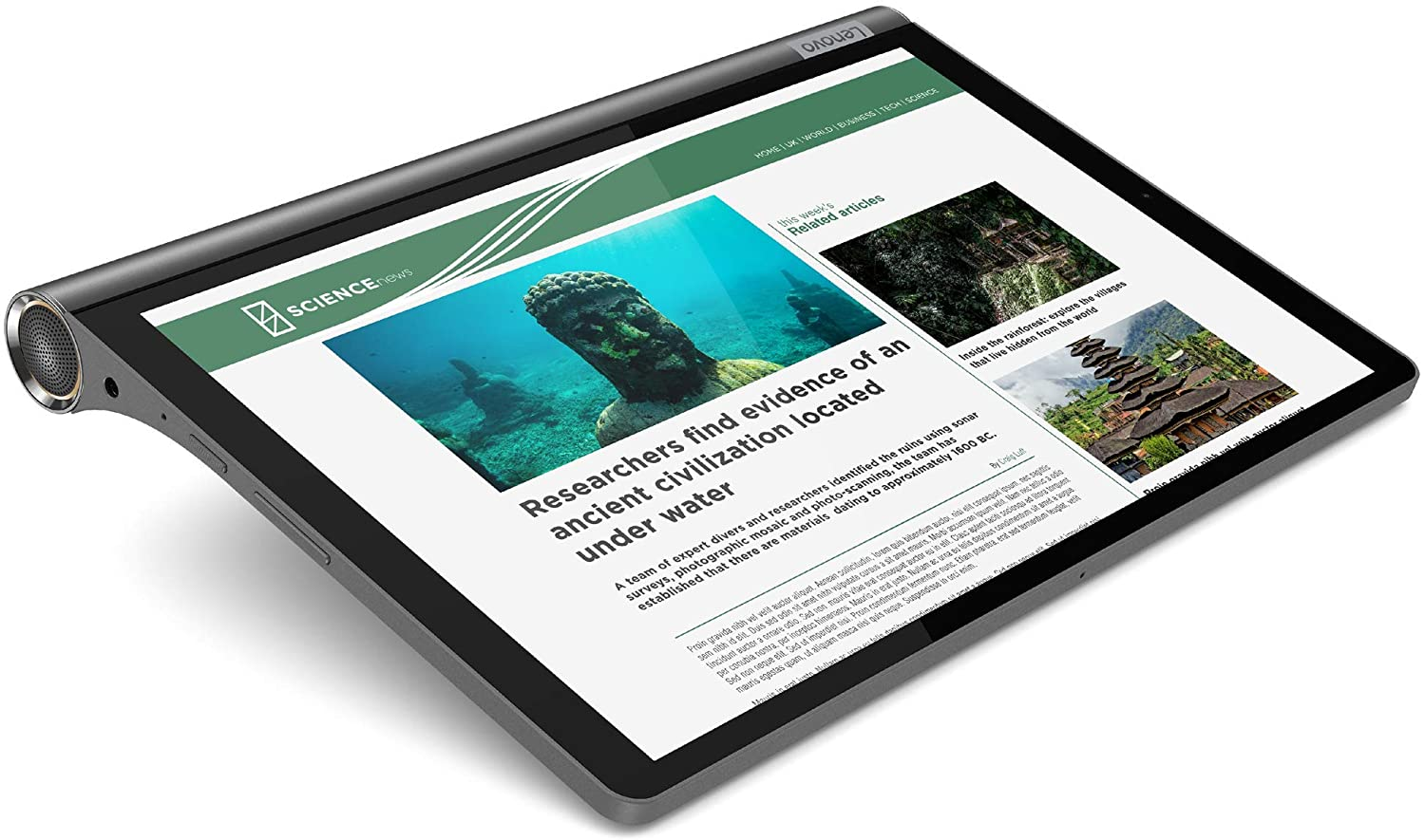 Tableta Lenovo con artículo de noticias, mostrando ruinas submarinas. Marco plateado, vista en ángulo.